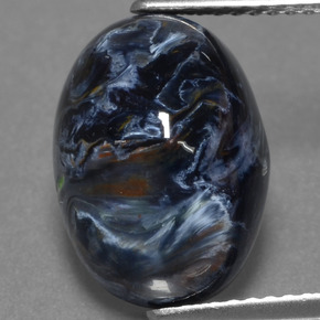 Pietersita multicolor natural de 5,89 ct, corte óvalo, opaco