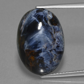 Pietersita multicolor natural de 10,63 ct, corte óvalo, opaco