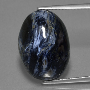 Pietersita multicolor natural de 10,97 ct, corte óvalo, opaco