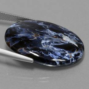 Pietersita multicolor natural de 27,49 ct, corte óvalo, opaco