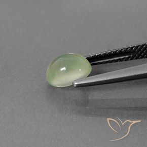 Prehnite Verde amarillo natural de 1.33 ct, Ovalada, Transparente / Translúcido