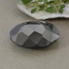 Pirita negro natural de 27,02 ct, corte óvalo, opaco