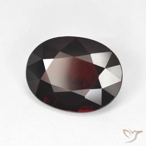 Granate piropo Rojo negruzco natural de 6.48 ct, Ovalada, VVS-VS