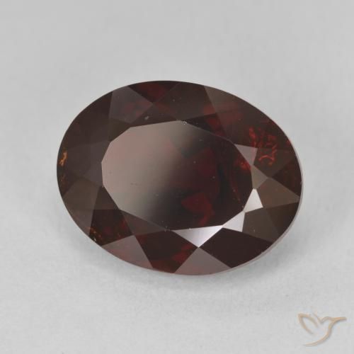 Granate piropo Rojo negruzco natural de 9.43 ct, Ovalada, VS-SI