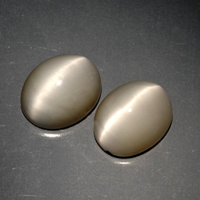 Gemas de quartz cat's eye gris natural de  ct, corte óvalo, opaco