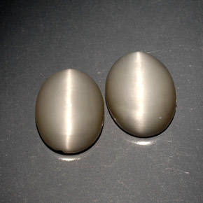 Gemas de quartz cat's eye gris natural de  ct, corte óvalo, opaco