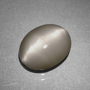 Quartz cat's eye crema natural de 1,97 ct, corte óvalo, opaco