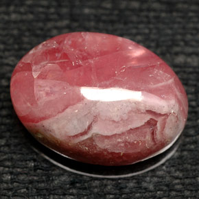 Rodocrosita multicolor natural de 8,43 ct, corte óvalo, opaco