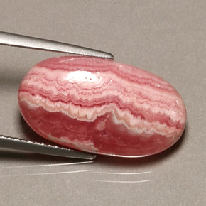 Rodocrosita multicolor natural de 13,08 ct, corte óvalo, opaco
