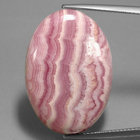 Rodocrosita multicolor natural de 35,26 ct, corte óvalo, opaco