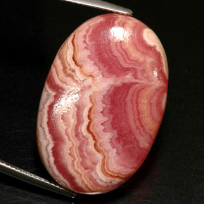 Rodocrosita multicolor natural de 32,96 ct, corte óvalo, opaco