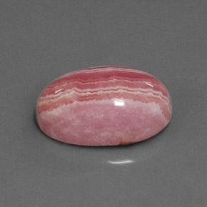 Rodocrosita multicolor natural de 6,80 ct, corte óvalo, opaco