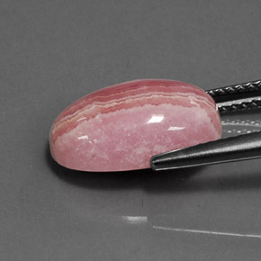 Rodocrosita multicolor natural de 6,80 ct, corte óvalo, opaco