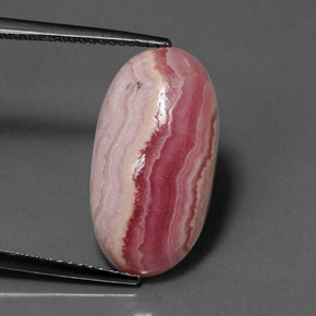 Rodocrosita multicolor natural de 9,97 ct, corte óvalo, opaco