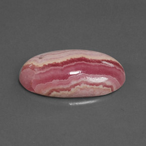 Rodocrosita multicolor natural de 9,97 ct, corte óvalo, opaco