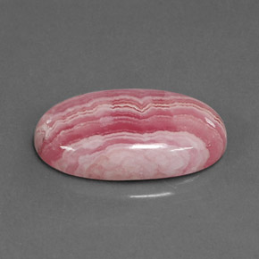 Rodocrosita multicolor natural de 8,66 ct, corte óvalo, opaco