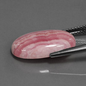 Rodocrosita multicolor natural de 8,66 ct, corte óvalo, opaco