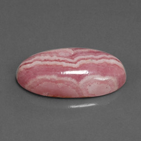 Rodocrosita multicolor natural de 9,70 ct, corte óvalo, opaco