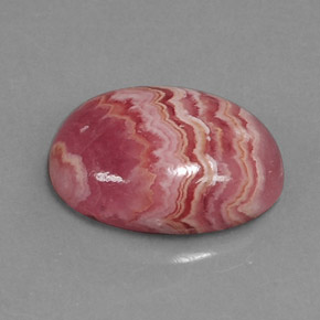 Rodocrosita multicolor natural de 7,26 ct, corte óvalo, opaco