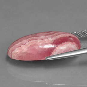 Rodocrosita multicolor natural de 15,90 ct, corte óvalo, opaco