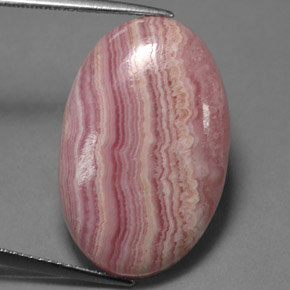 Rodocrosita multicolor natural de 19,97 ct, corte óvalo, opaco