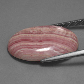 Rodocrosita multicolor natural de 19,97 ct, corte óvalo, opaco