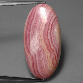Rodocrosita multicolor natural de 21,19 ct, corte óvalo, opaco
