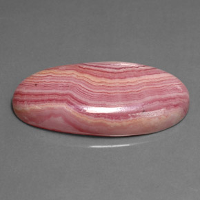 Rodocrosita multicolor natural de 21,19 ct, corte óvalo, opaco