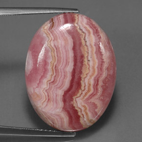 Rodocrosita multicolor natural de 24,57 ct, corte óvalo, opaco