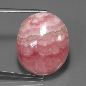 Rodocrosita multicolor natural de 33,77 ct, corte óvalo, opaco