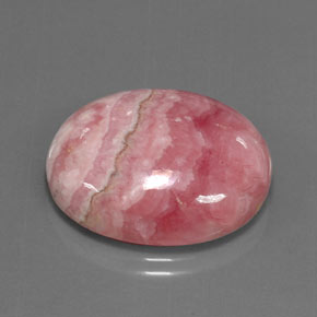 Rodocrosita multicolor natural de 33,77 ct, corte óvalo, opaco
