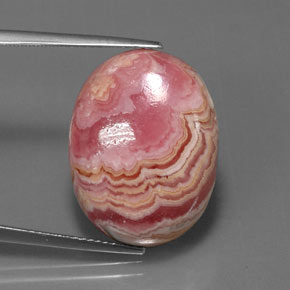 Rodocrosita multicolor natural de 21,53 ct, corte óvalo, opaco