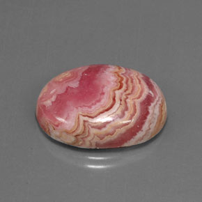 Rodocrosita multicolor natural de 21,53 ct, corte óvalo, opaco