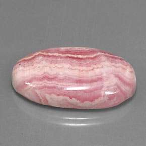 Rodocrosita multicolor natural de 29,88 ct, corte óvalo, opaco