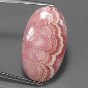 Rodocrosita multicolor natural de 22,52 ct, corte óvalo, opaco