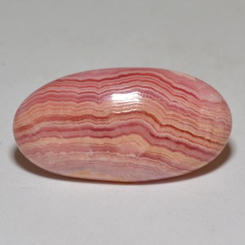 Rodocrosita multicolor natural de 23,40 ct, corte óvalo, opaco