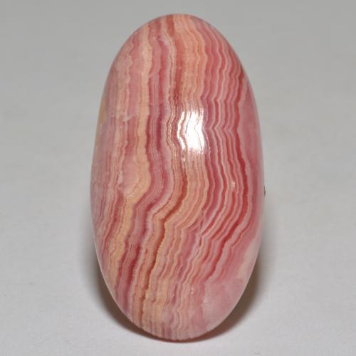 Rodocrosita multicolor natural de 23,40 ct, corte óvalo, opaco