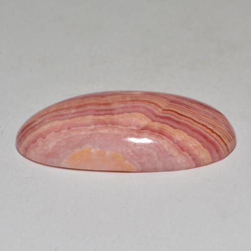 Rodocrosita multicolor natural de 23,40 ct, corte óvalo, opaco