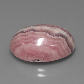 Rodocrosita multicolor natural de 15,61 ct, corte óvalo, opaco