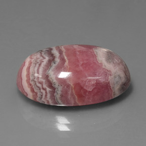 Rodocrosita multicolor natural de 26,95 ct, corte óvalo, opaco