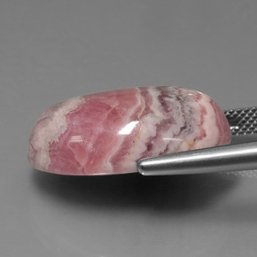 Rodocrosita multicolor natural de 26,95 ct, corte óvalo, opaco