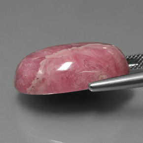 Rodocrosita multicolor natural de 31,54 ct, corte óvalo, opaco