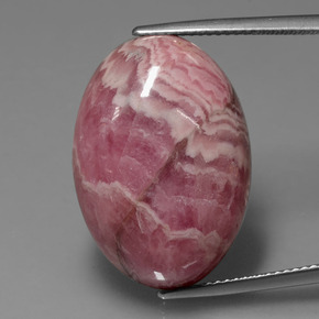 Rodocrosita multicolor natural de 32,83 ct, corte óvalo, opaco