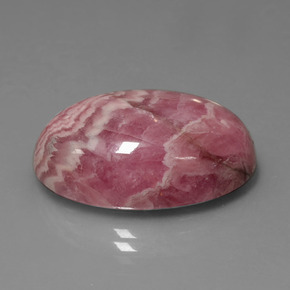 Rodocrosita multicolor natural de 32,83 ct, corte óvalo, opaco