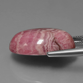 Rodocrosita multicolor natural de 32,83 ct, corte óvalo, opaco