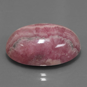 Rodocrosita multicolor natural de 29,62 ct, corte óvalo, opaco
