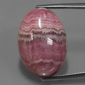 Rodocrosita multicolor natural de 33,91 ct, corte óvalo, opaco