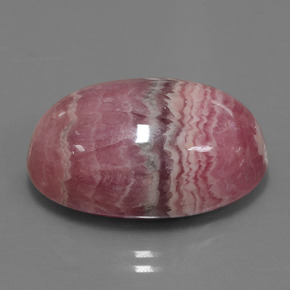 Rodocrosita multicolor natural de 33,91 ct, corte óvalo, opaco