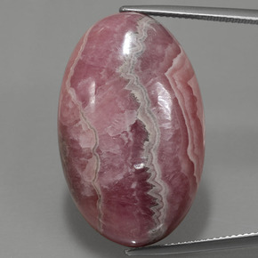 Rodocrosita multicolor natural de 56,15 ct, corte óvalo, opaco