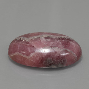 Rodocrosita multicolor natural de 56,15 ct, corte óvalo, opaco